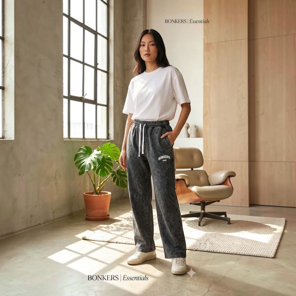 City Center premium Korean-style charcoal acid-wash joggers worn by a woman with a white t-shirt in a modern room