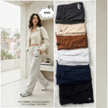 City Center Korean-style wide-leg baggy track pants in various colors worn by a model with a matching crop top