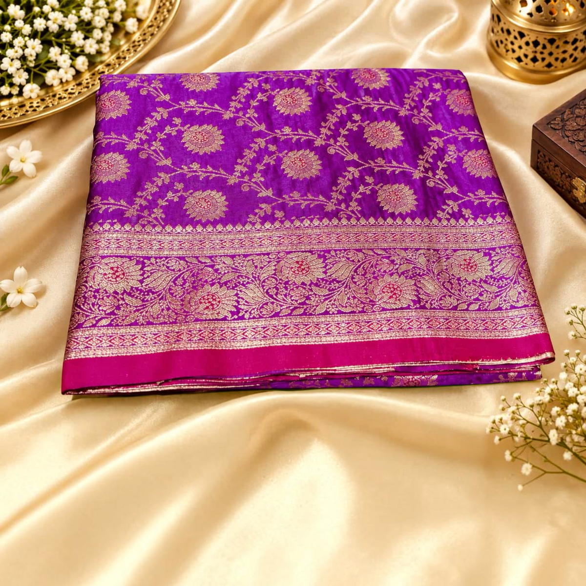 City Center satin silk saree in deep purple with intricate gold floral zari border and traditional woven patterns