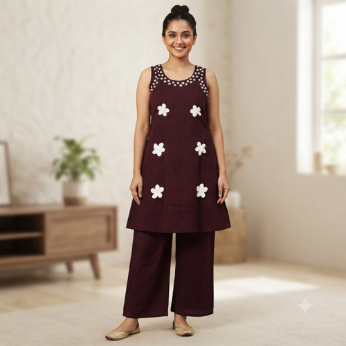 City Center dark maroon co-ord set featuring a sleeveless tunic with white floral appliques and matching wide pants.