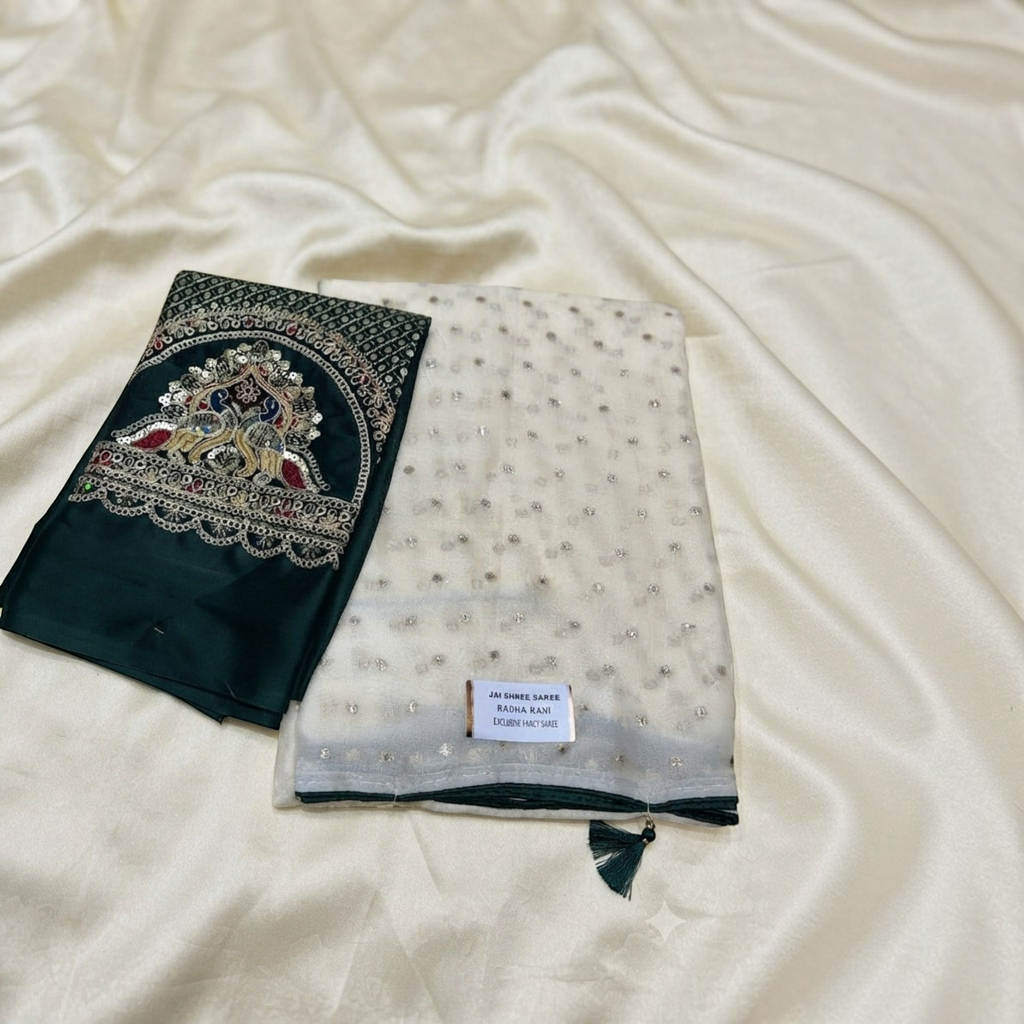 City Center Radha Rani saree featuring an off-white sheer fabric with silver sequins and a dark green embroidered pallu