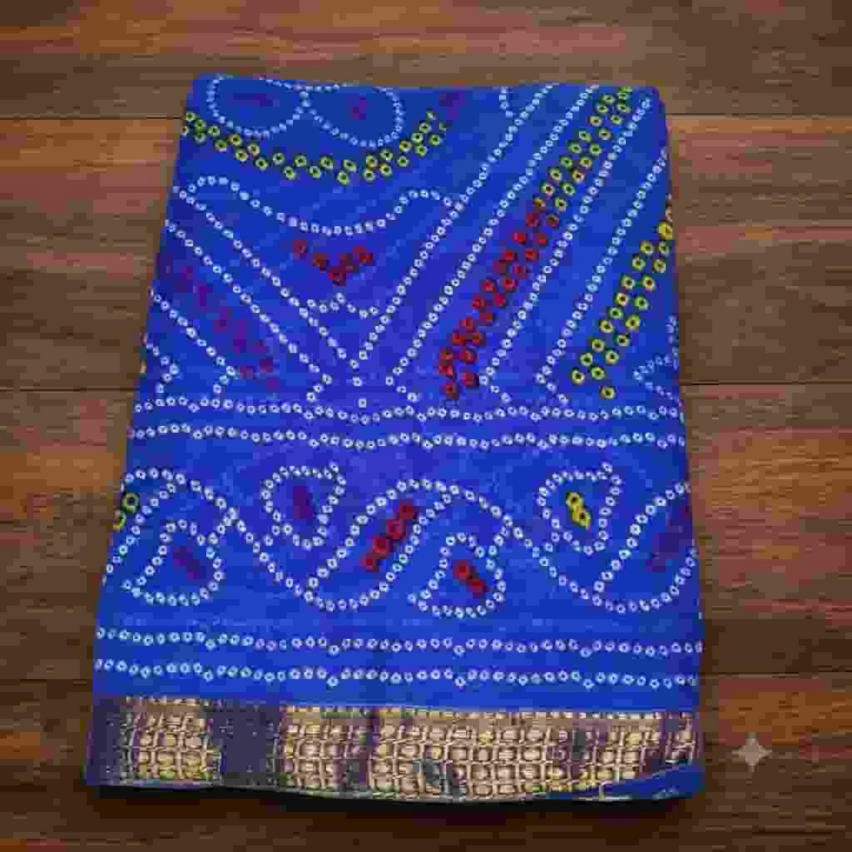 City Center Bandhan silk saree in vibrant blue with traditional white and red bandhani tie-dye patterns and gold border