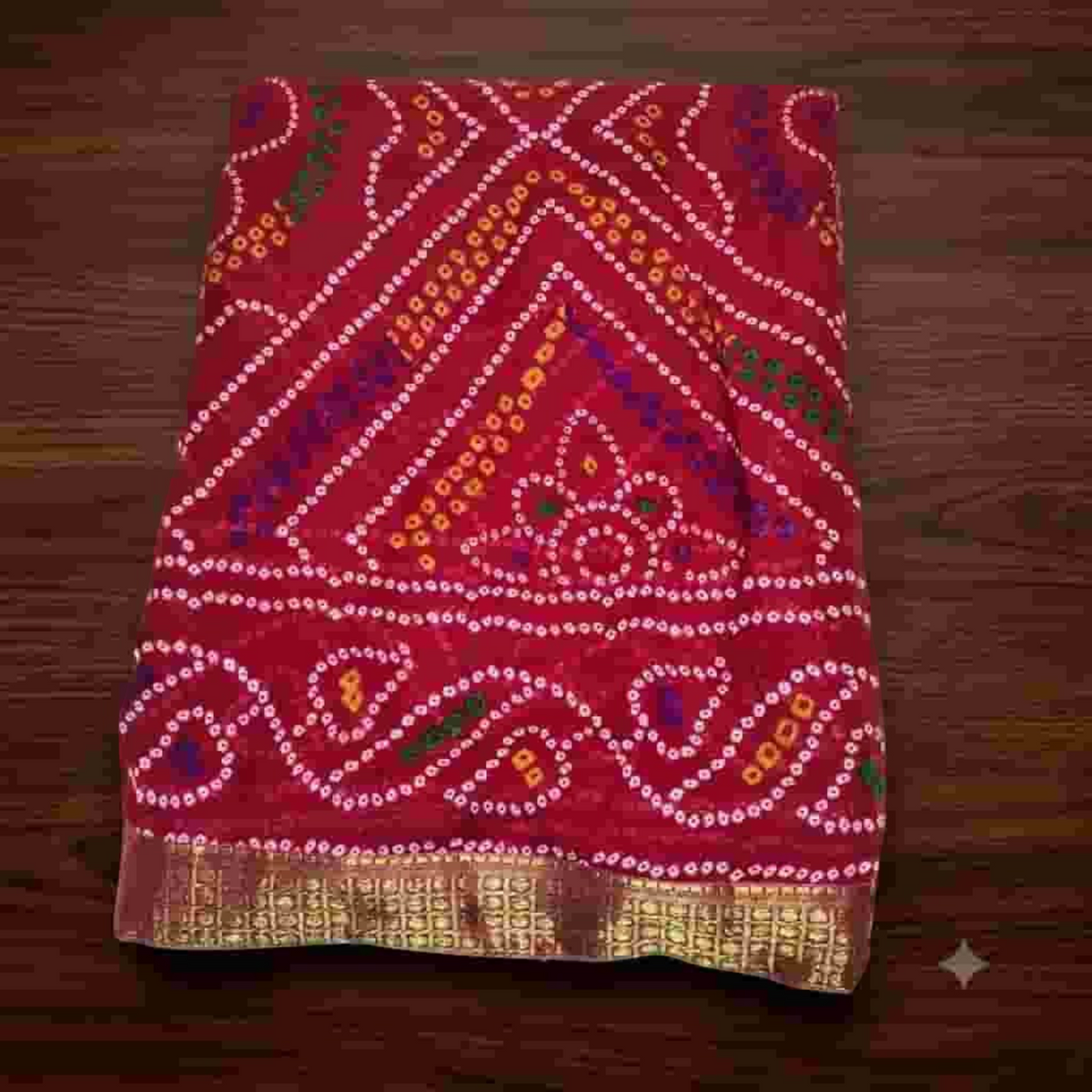 City Center Bandhan silk saree in deep red with traditional white and yellow bandhani tie-dye patterns and gold border