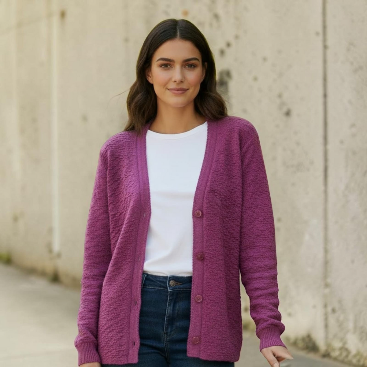 City Center women's purple button-up cardigan sweater with a textured knit, worn over a white t-shirt and jeans.