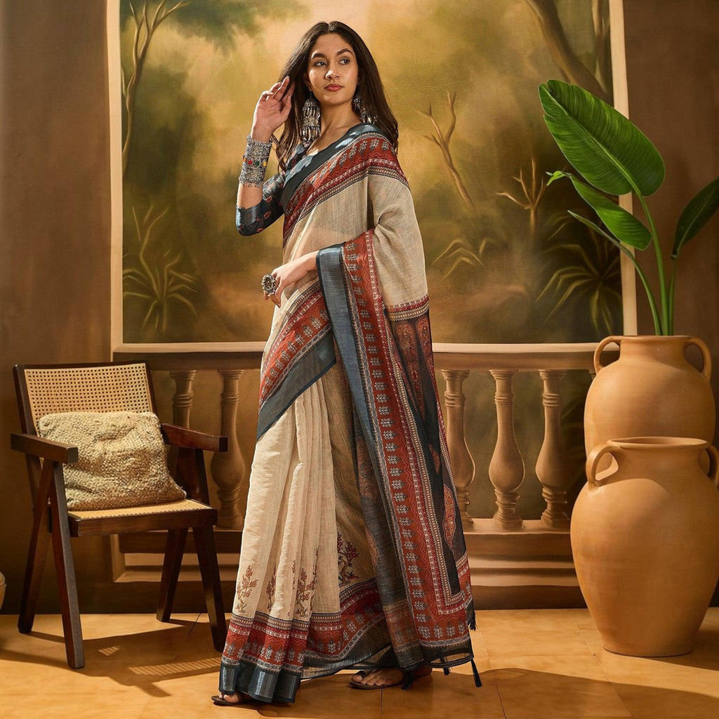 City Center premium cotton saree in beige with a dark grey and rust red patterned border worn by a model