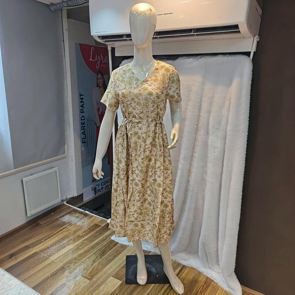 City Center beige floral print midi dress with a V-neck, short sleeves, and a cinched waist on a mannequin