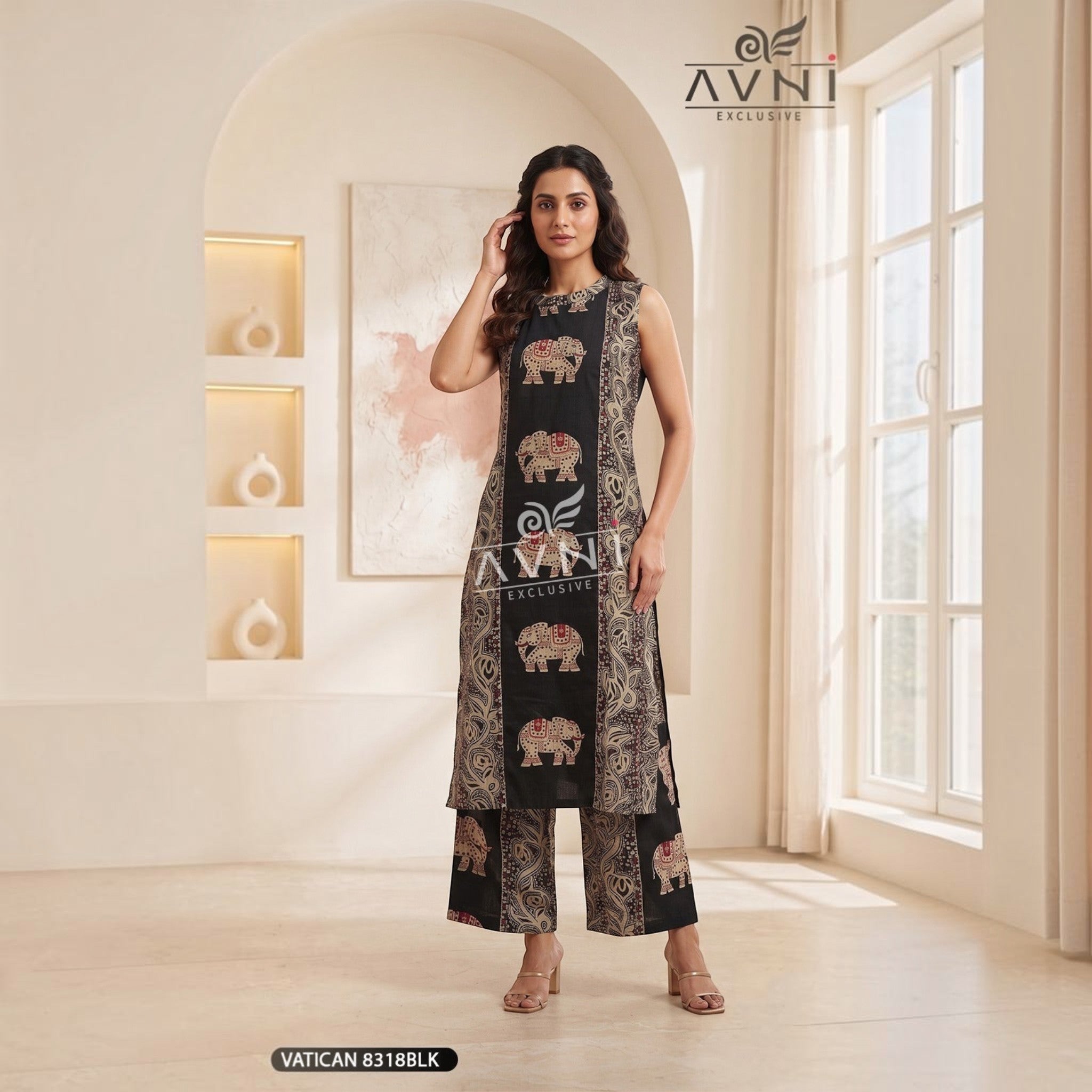 City Center Avni Collection black ethnic co-ord set featuring elephant motifs and wide-leg trousers on a model