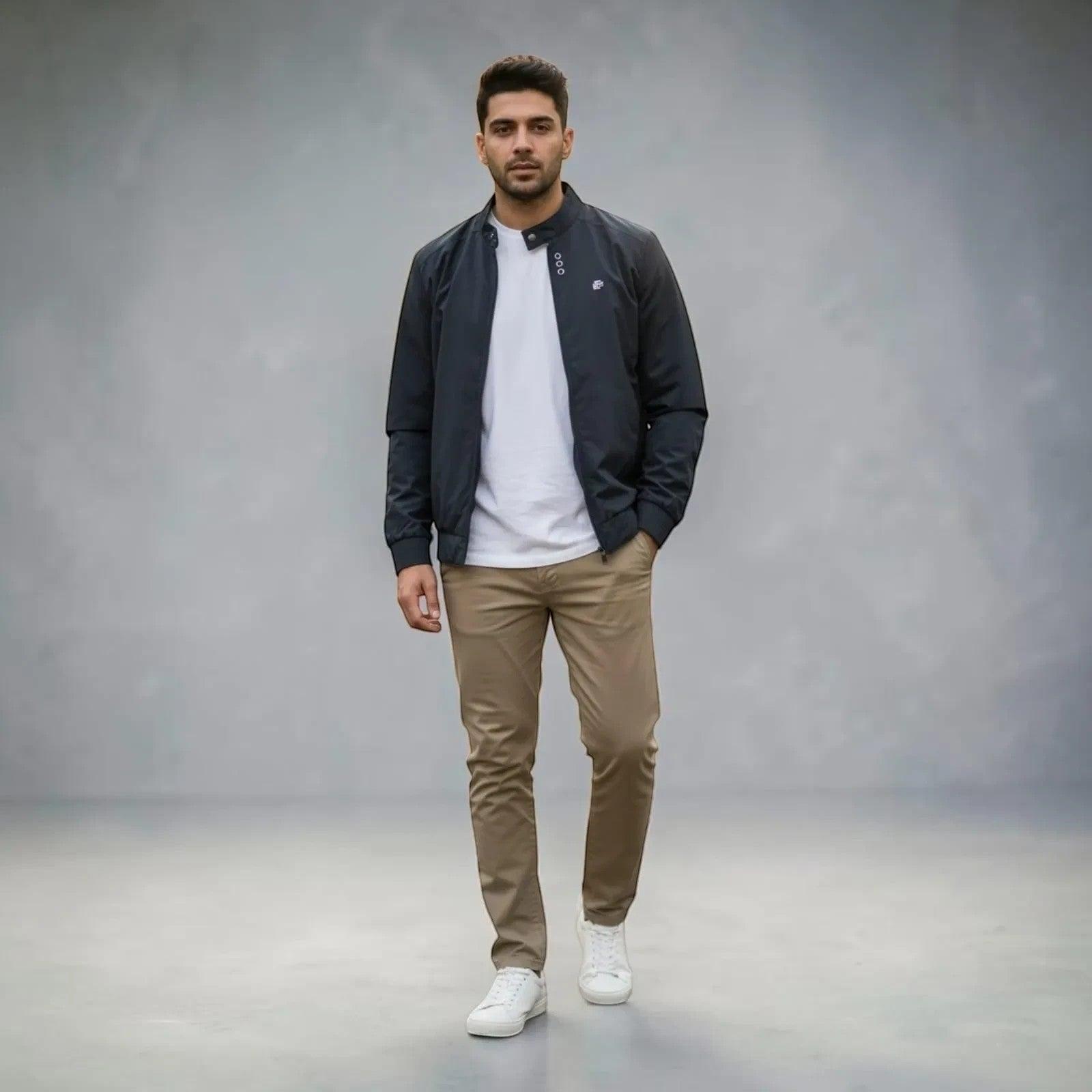 City Center men's black full-zip casual jacket worn over a white t-shirt and khaki trousers against a grey backdrop