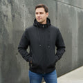 City Center light weight black hooded jacket with a zip-up front and ribbed cuffs worn by a man against a grey wall