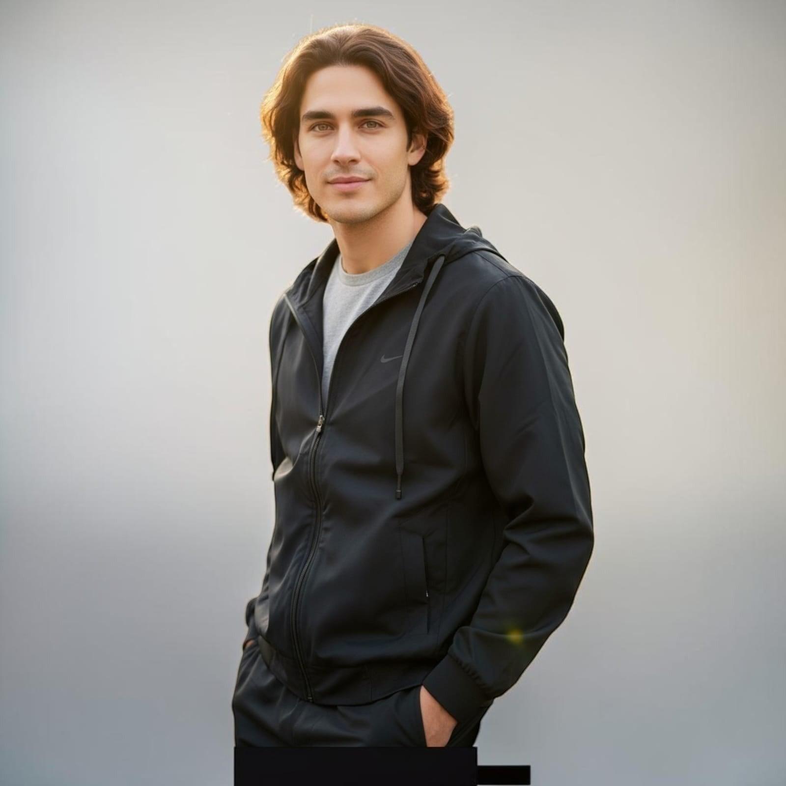 City Center premium lightweight black hooded jacket worn by a man with brown hair against a neutral background