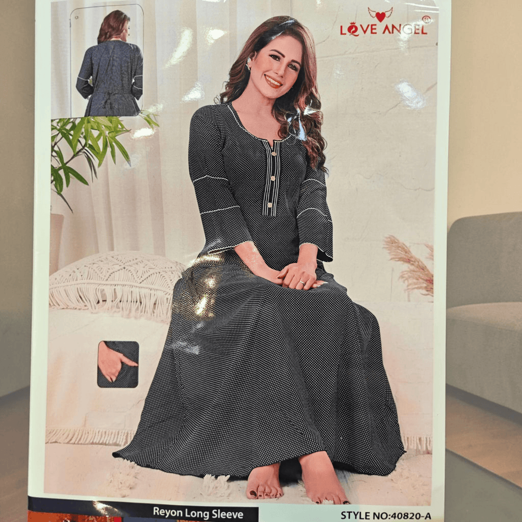 City Center black A-line rayon gown with white polka dots, three-quarter sleeves, and button-down neckline detail.