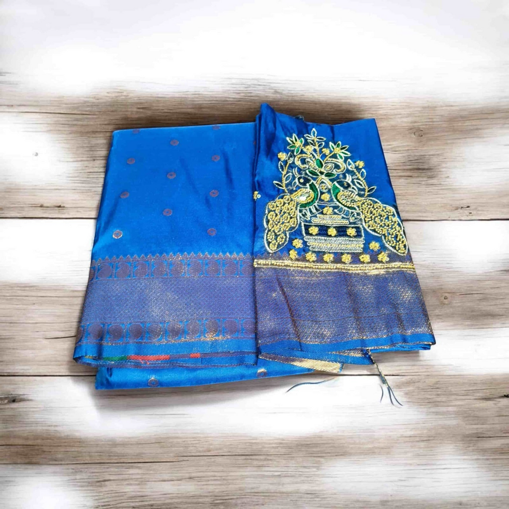 City Center blue saree with intricate gold and green peacock aari work embroidery on the blouse