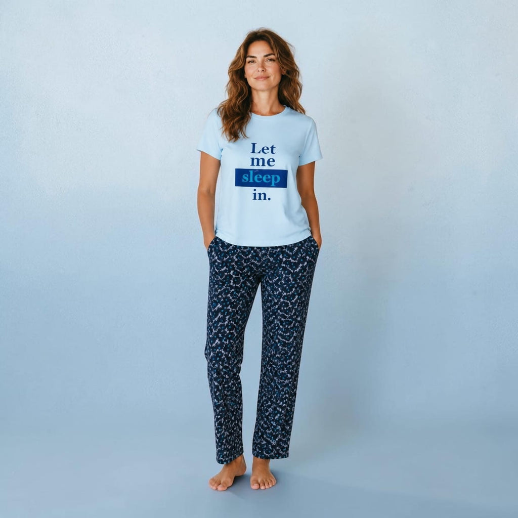 City Center co-ord set featuring a light blue t-shirt with Let me sleep in text and patterned dark blue trousers.