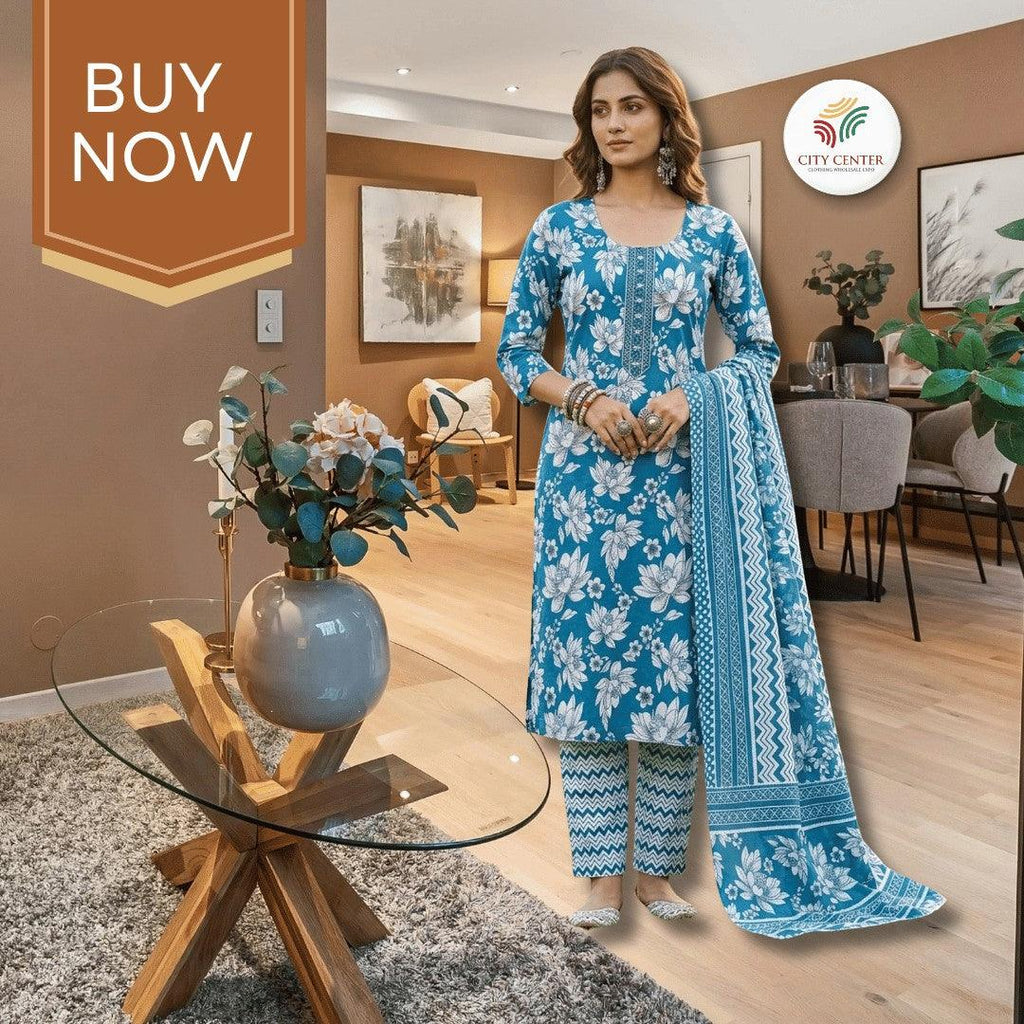 City Center blue cotton kurti set with white floral print, matching bottoms, and dupatta worn by a model indoors.
