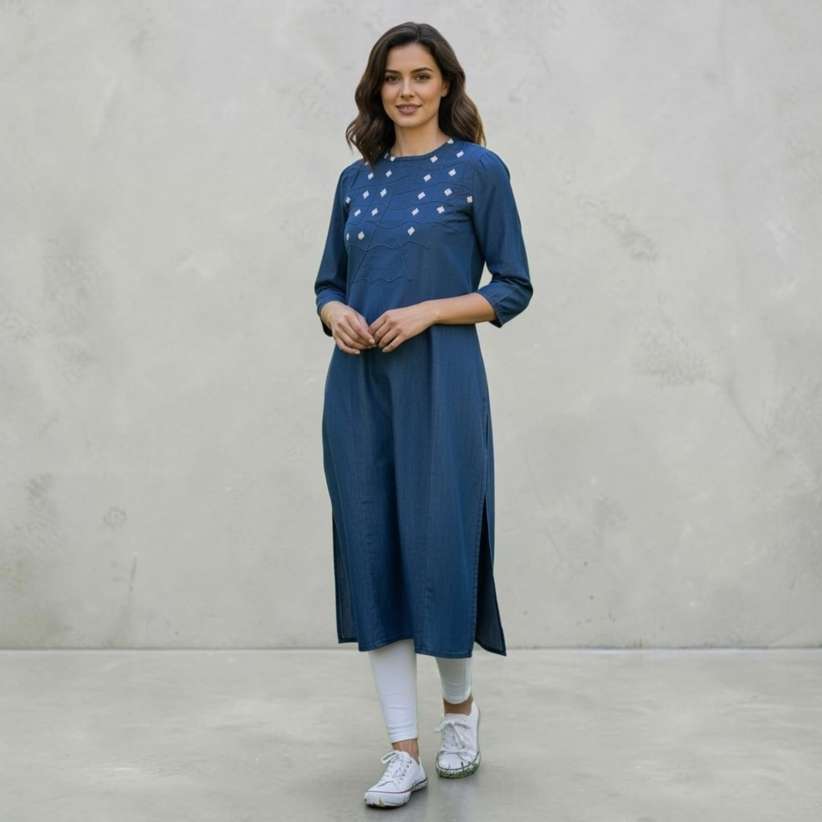 City Center premium blue cotton denim kurti with white embroidery details worn by a model with white leggings