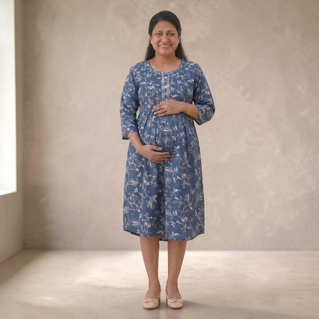 City Center blue floral cotton maternity and nursing gown with concealed zippers on a smiling pregnant woman