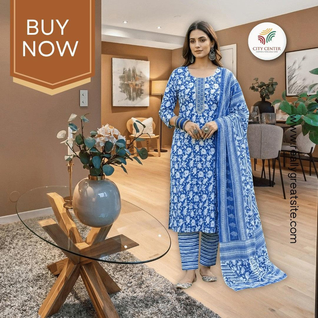 City Center blue Jaipuri print cotton kurti set with matching bottoms and dupatta worn by a model in a home interior.