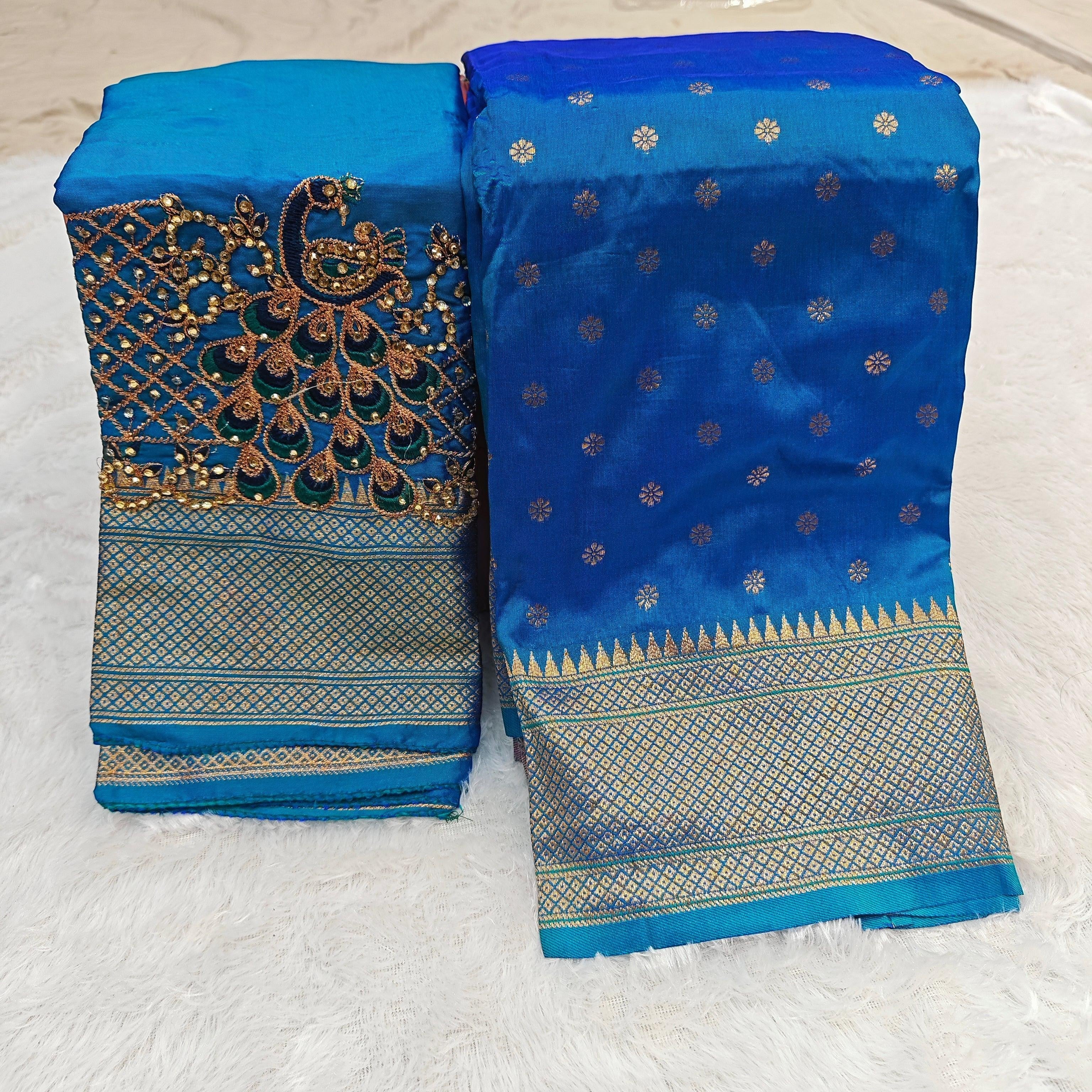 City Center blue Kalanjali silk saree with gold woven border and matching blouse featuring intricate peacock Aari work