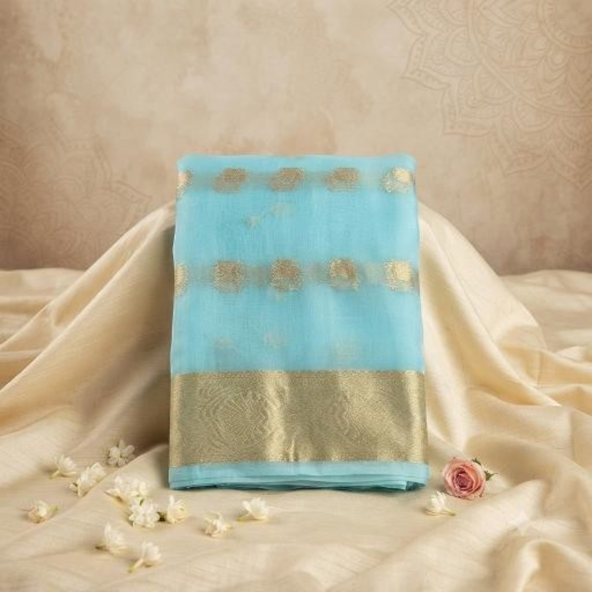 City Center light blue organza saree featuring gold beet work embroidery and a wide metallic border