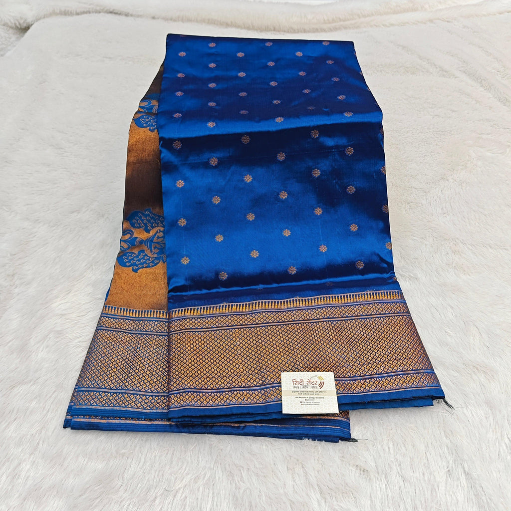 City Center blue silk Paithani saree with gold zari peacock border and intricate woven motifs for festive wear.
