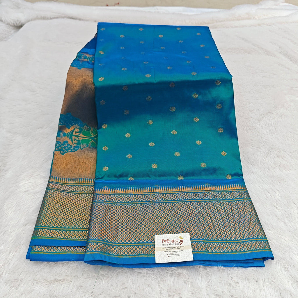 City Center blue Kalanjali Paithani silk saree with gold peacock motif zari border and intricate woven pallu