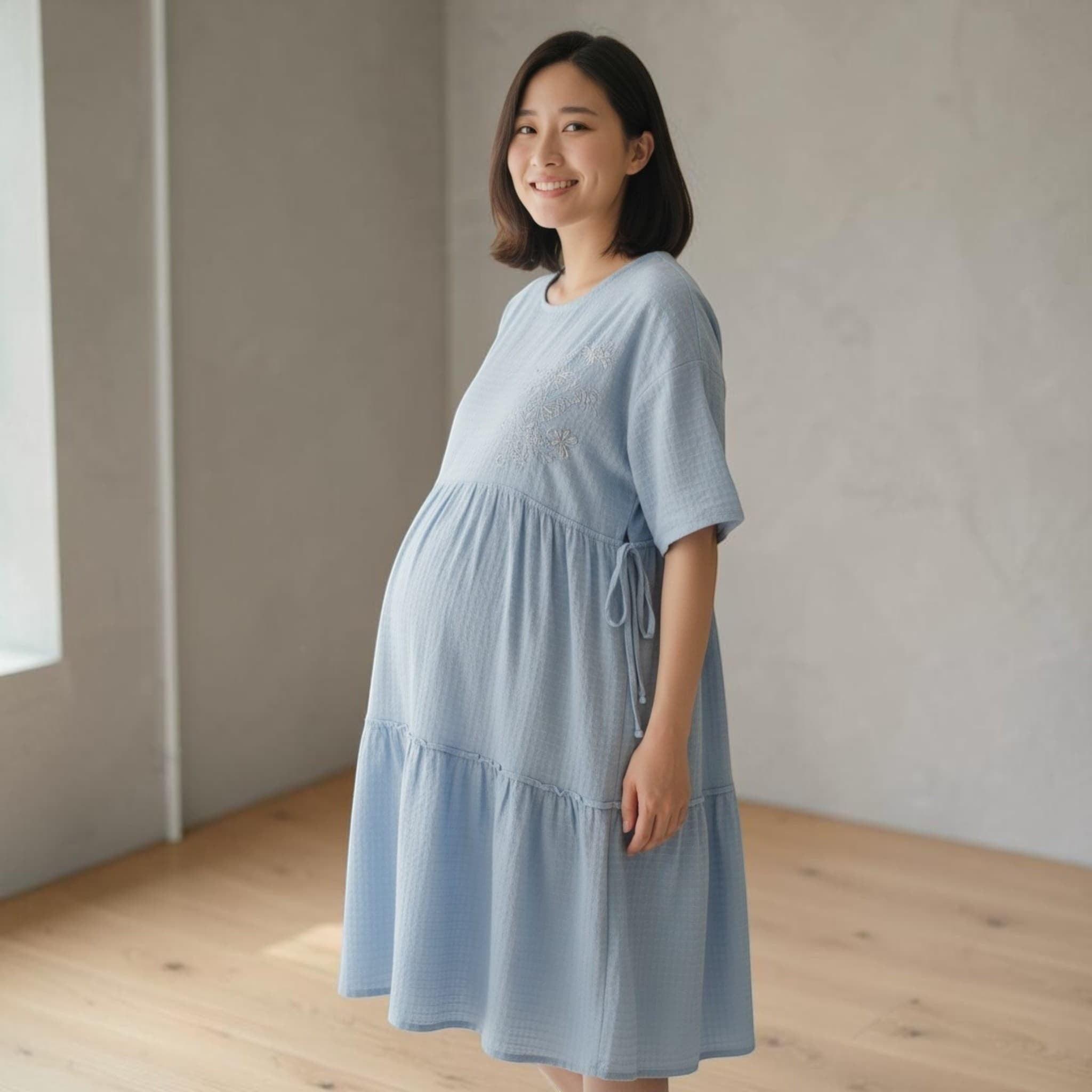 City Center light blue rayon feeding kurti with tiered skirt and side ties worn by a smiling pregnant woman