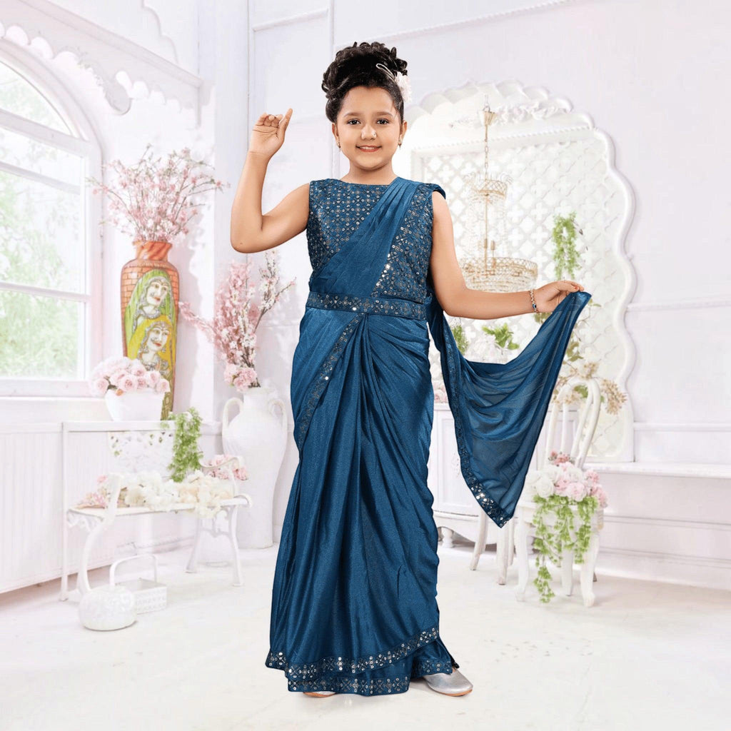 City Center girl wearing a blue shimmer Lycra ready-to-wear saree with an embroidered sleeveless blouse.