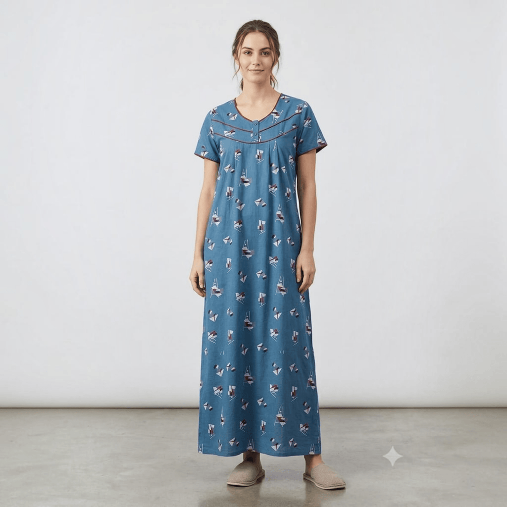 City Center blue alpine fabric feeding gown with sailboat print, neck embroidery, and relaxed A-line fit on a model.