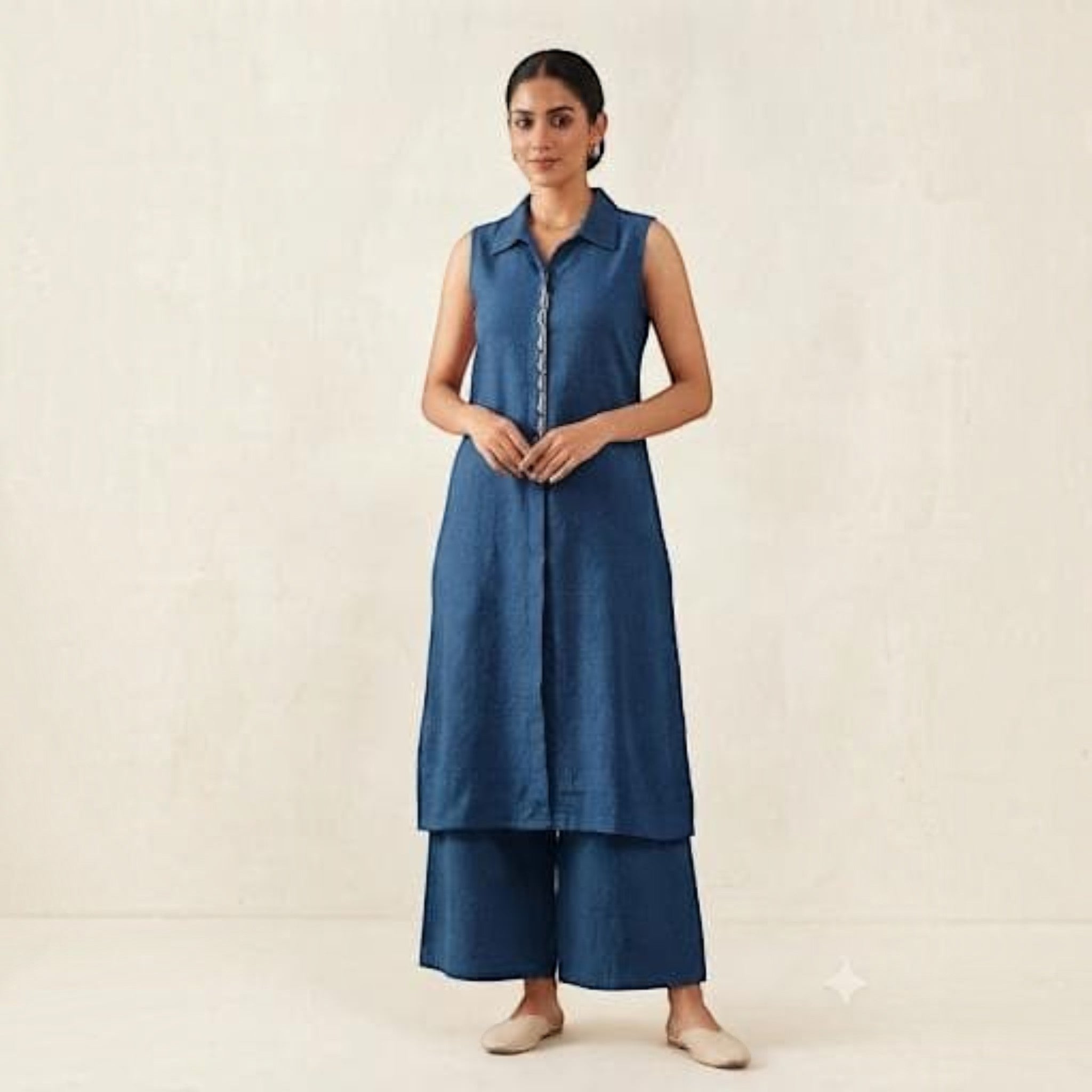 City Center premium blue sleeveless long shirt and wide-leg trouser co-ord set worn by a model