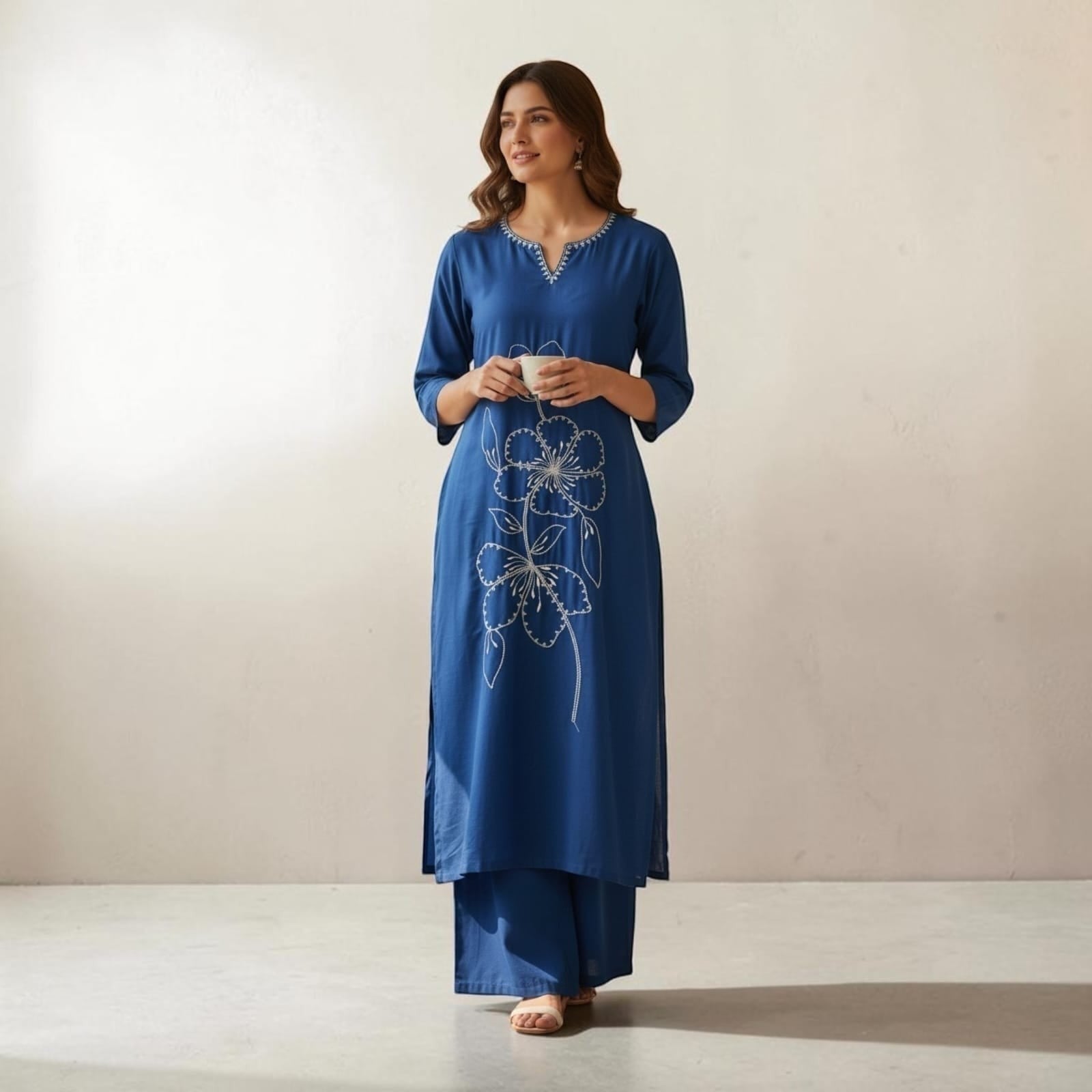 City Center blue Vatican fabric cord set featuring a long embroidered kurti with floral detail and matching wide pants