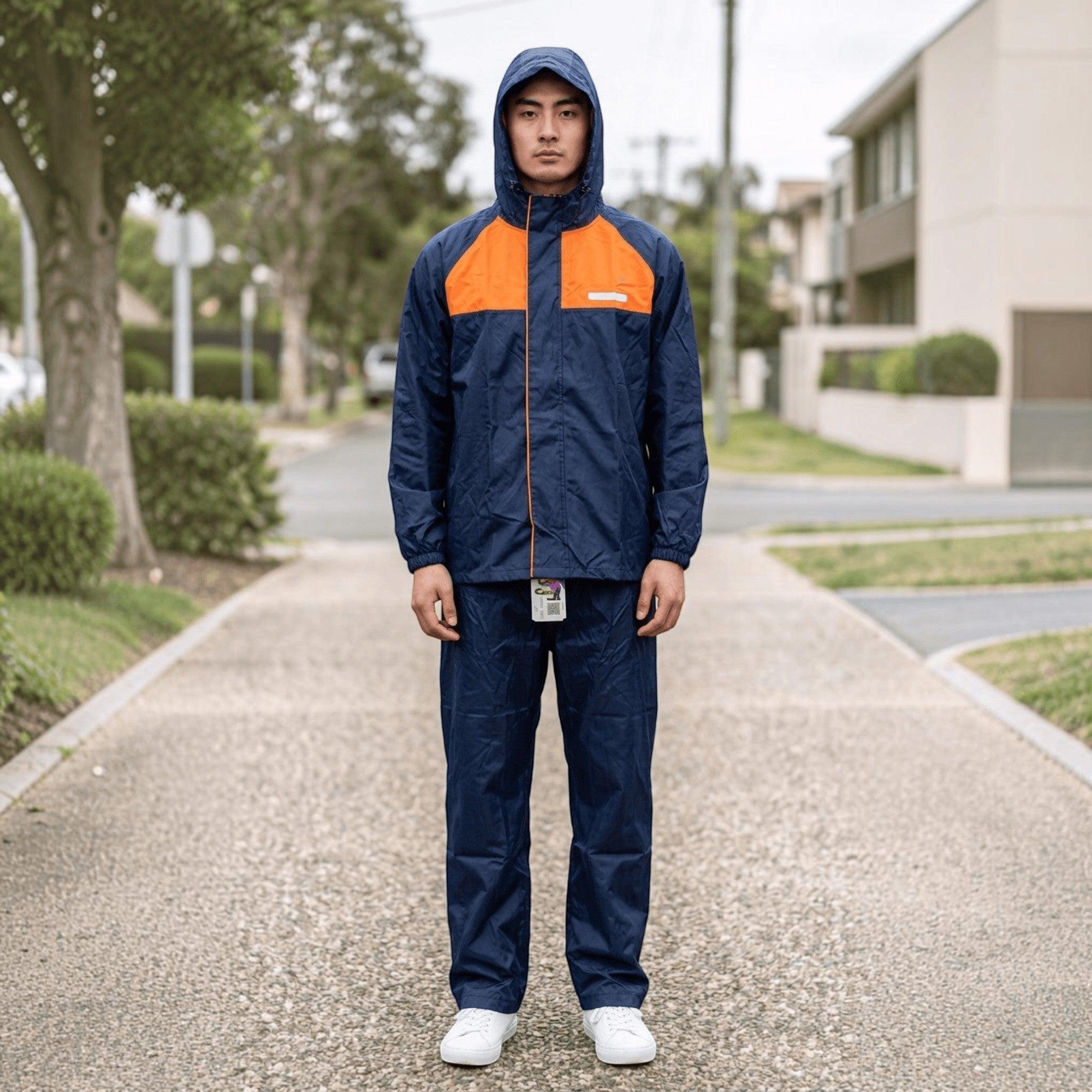 City Center Top In Town Little Wonder boys waterproof rain suit in navy blue with high-visibility orange panels.