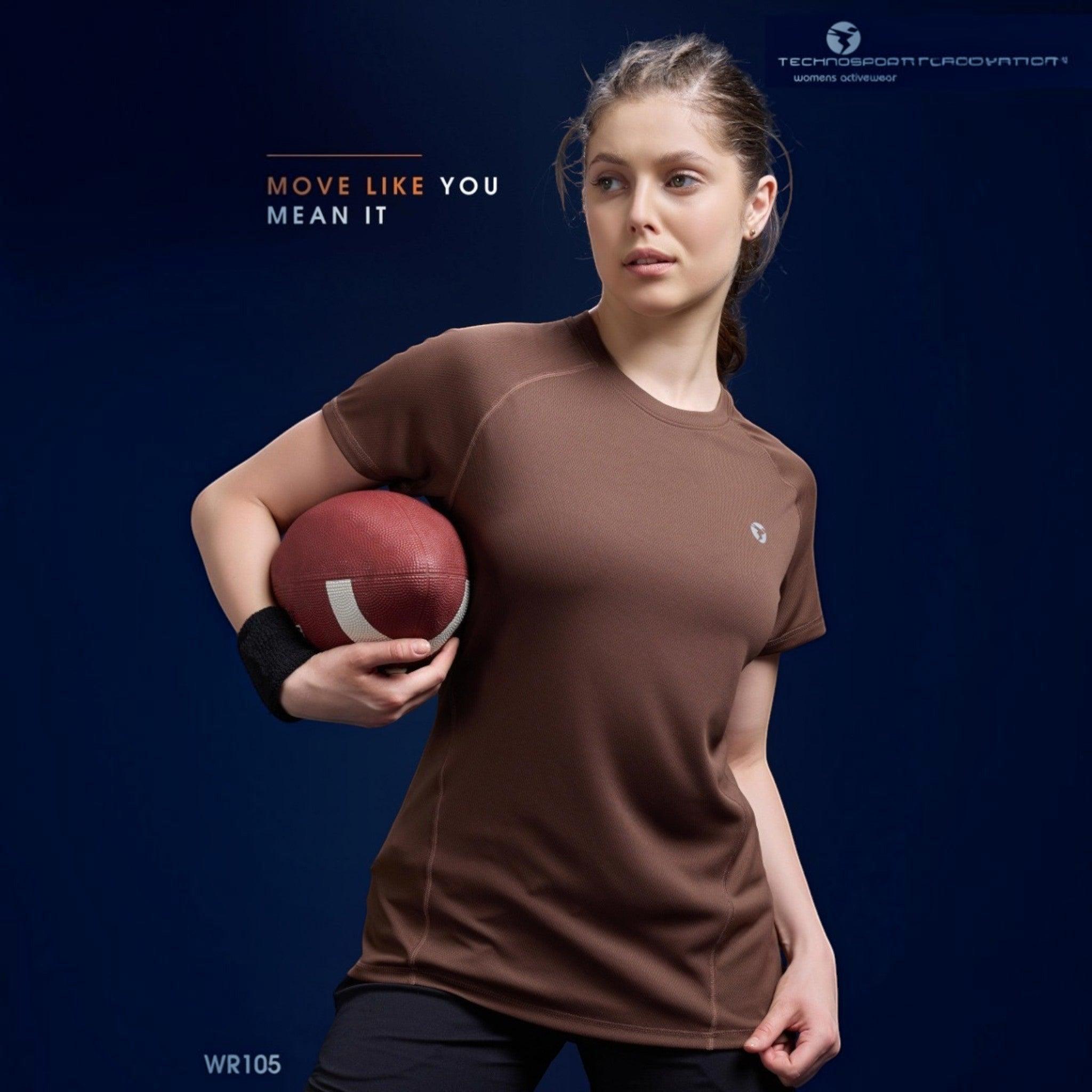 City Center WR105 Technosports brown moisture-wicking activewear t-shirt worn by a woman holding a football