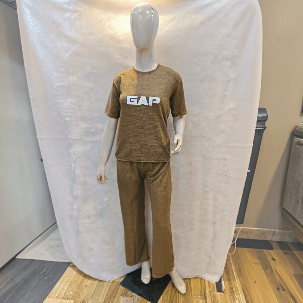 City Center brown Korean airport cord set with short sleeves and relaxed fit trousers on a mannequin