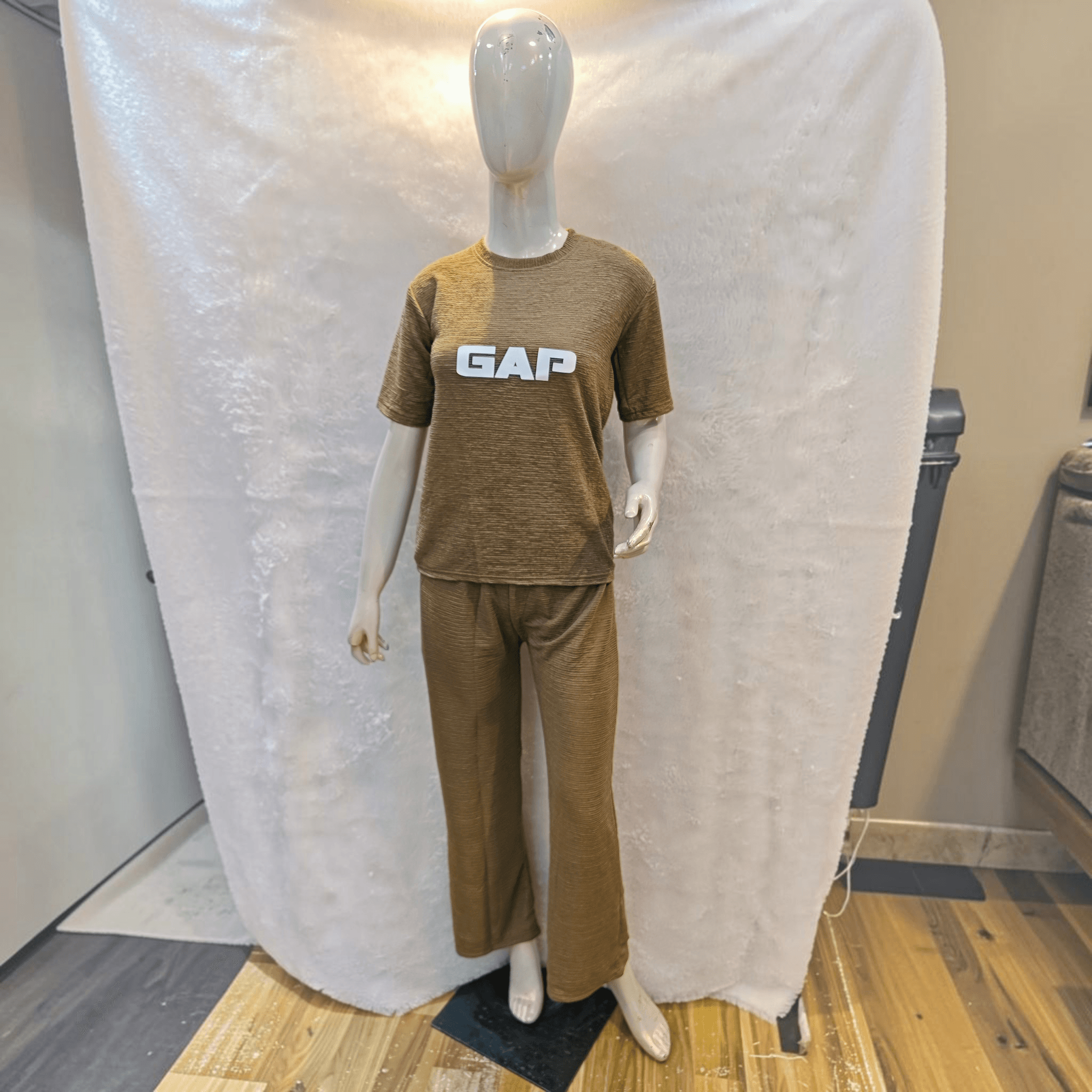 City Center brown Korean airport cord set with short sleeves and relaxed fit trousers on a mannequin