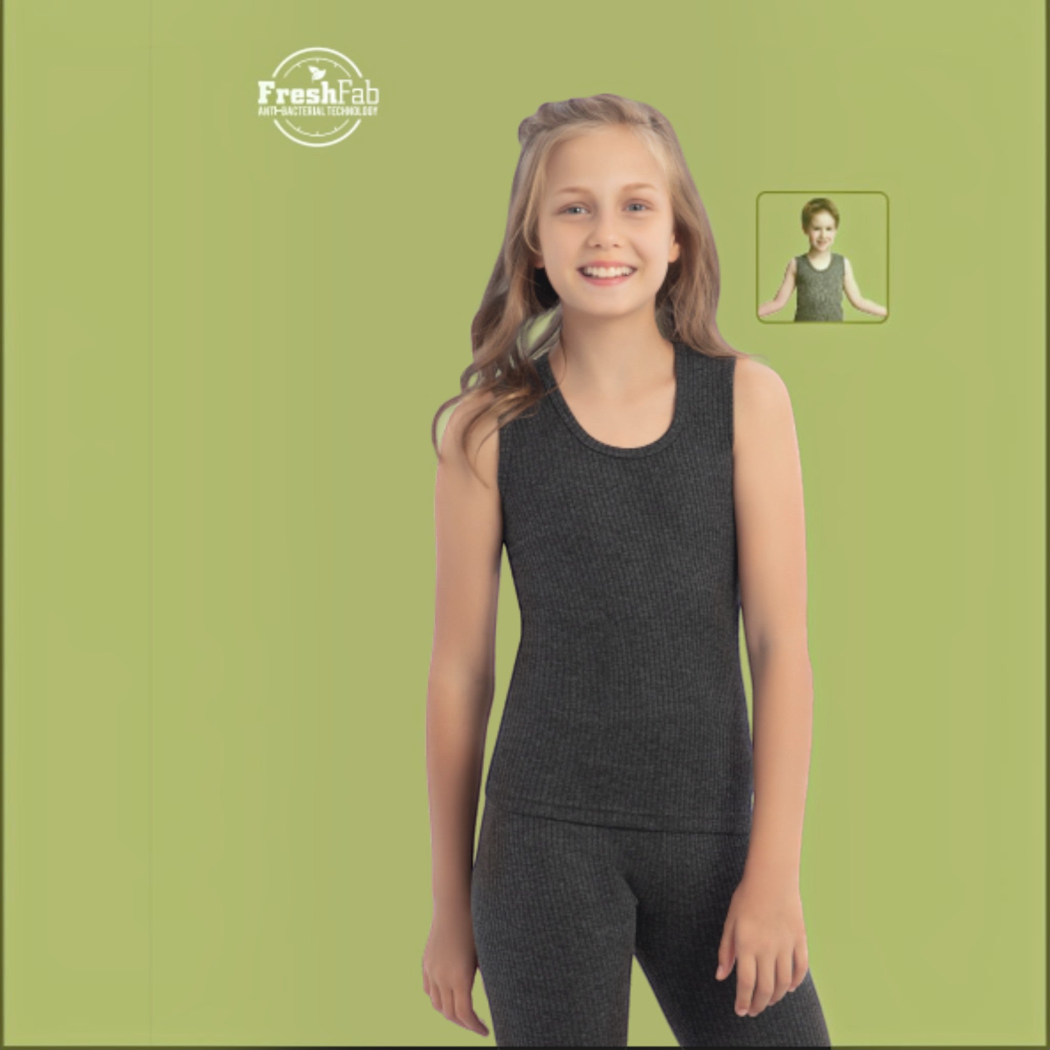 City Center Body Care Kids Art No. 305 charcoal grey ribbed sleeveless base layer set worn by a smiling young girl