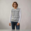 City Center Diamond Touch angora-blend grey and white patterned sweater vest worn by a man over a long-sleeve shirt.
