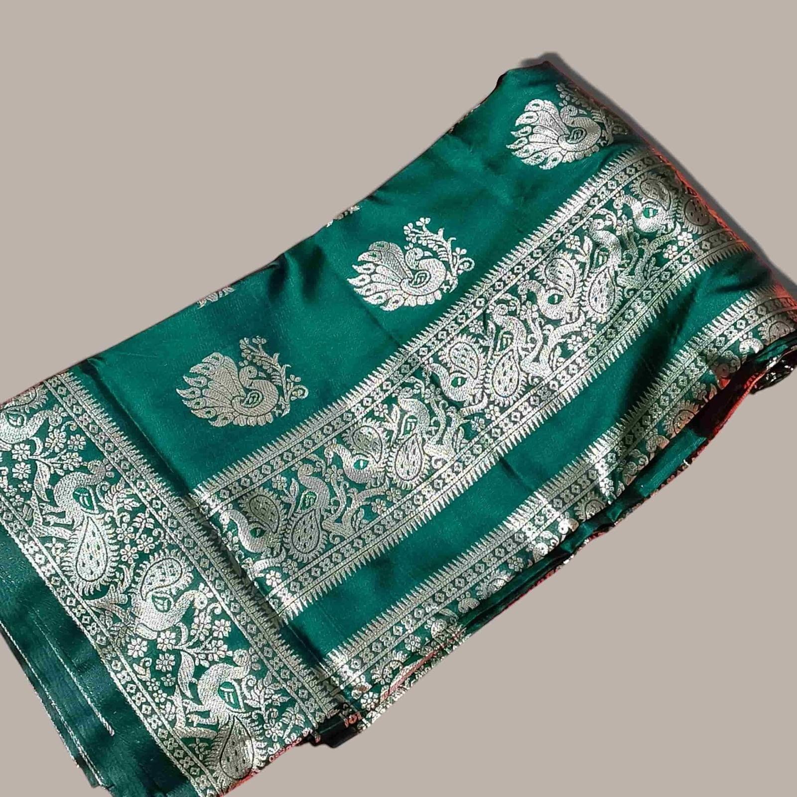City Center emerald green pure silk Peshwai saree with intricate silver zari peacock and paisley motifs on the border