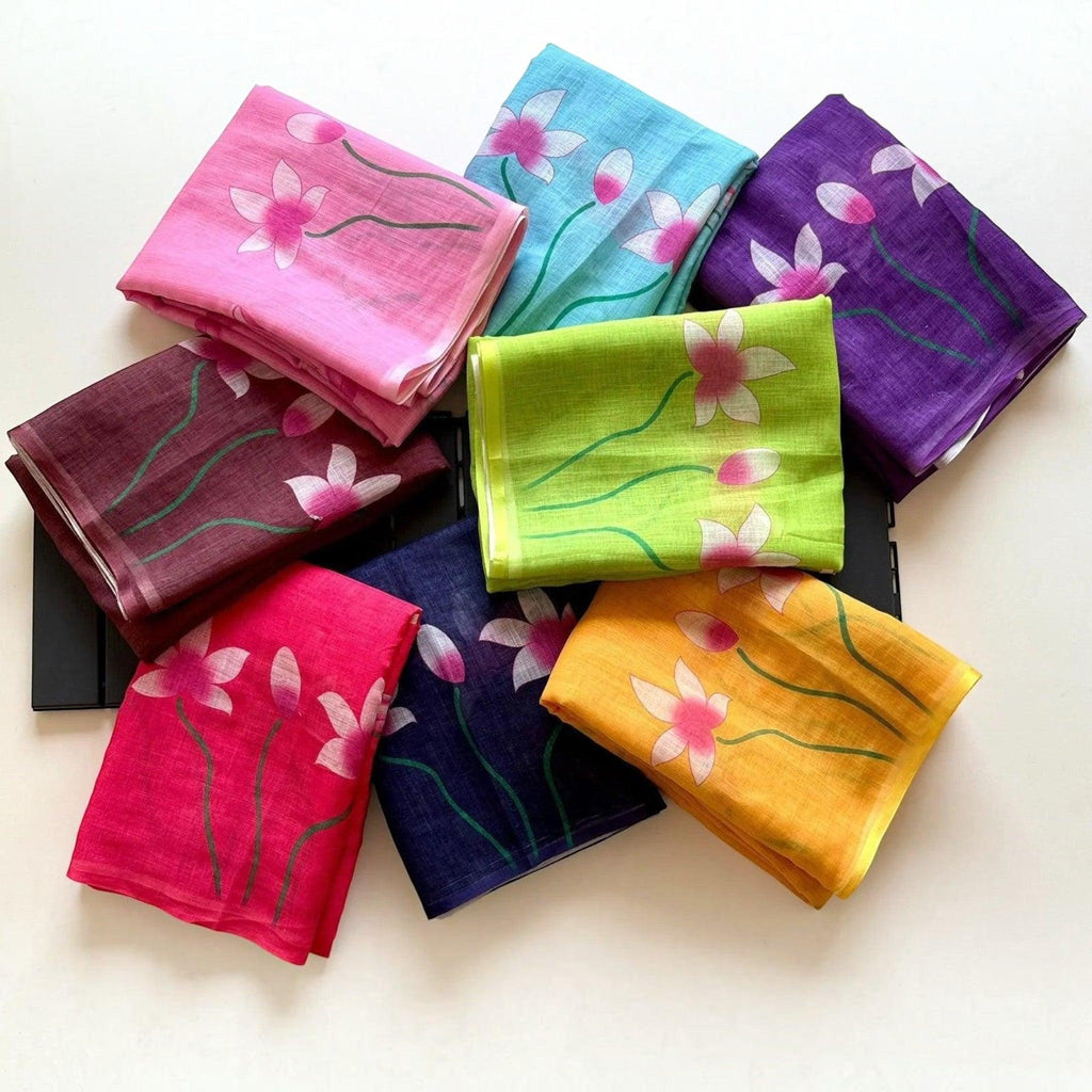 City Center floral print linen fabric collection in vibrant colors including pink, turquoise, purple, yellow, and green.