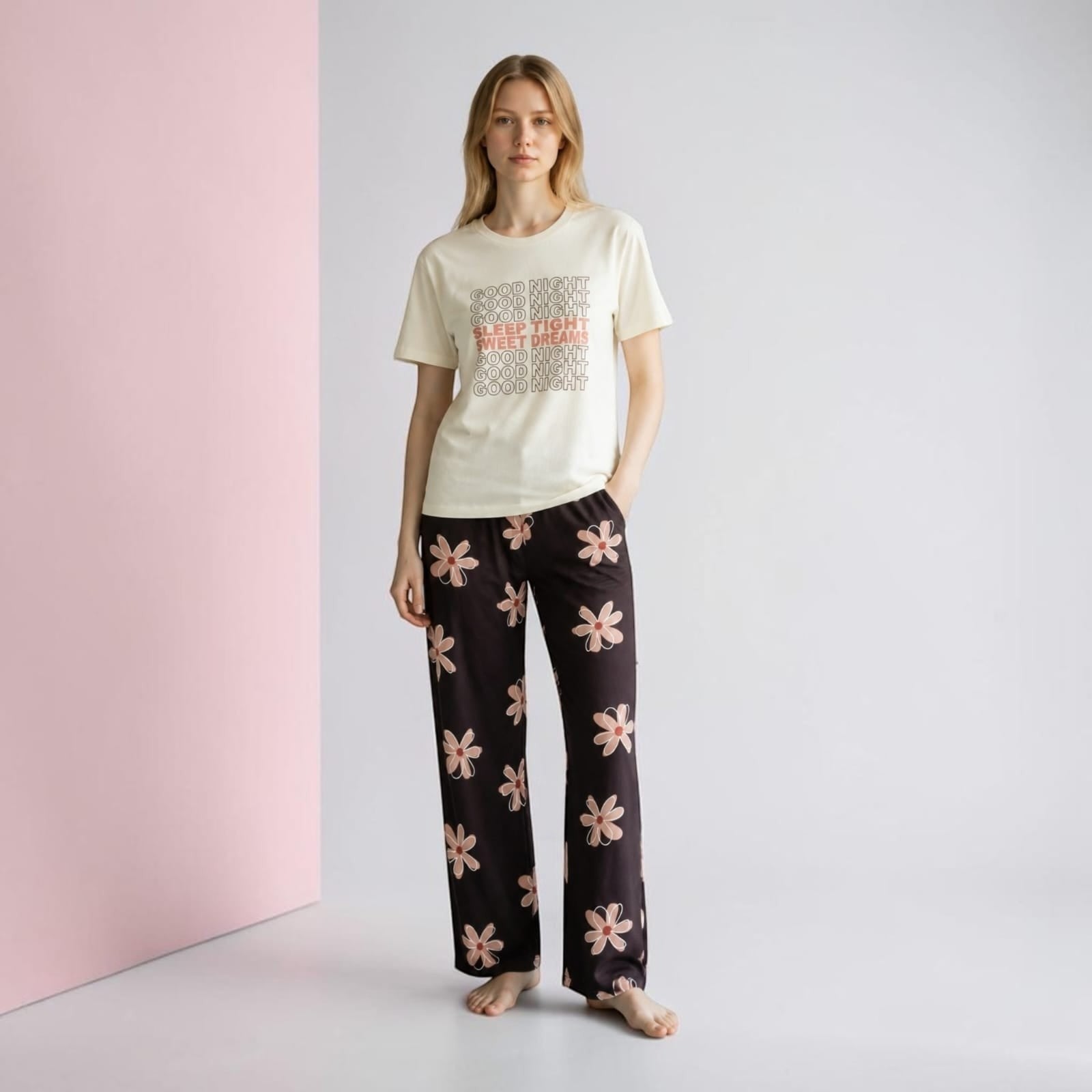 City Center co-ord set featuring a cream graphic t-shirt and black floral print lounge pants on a model