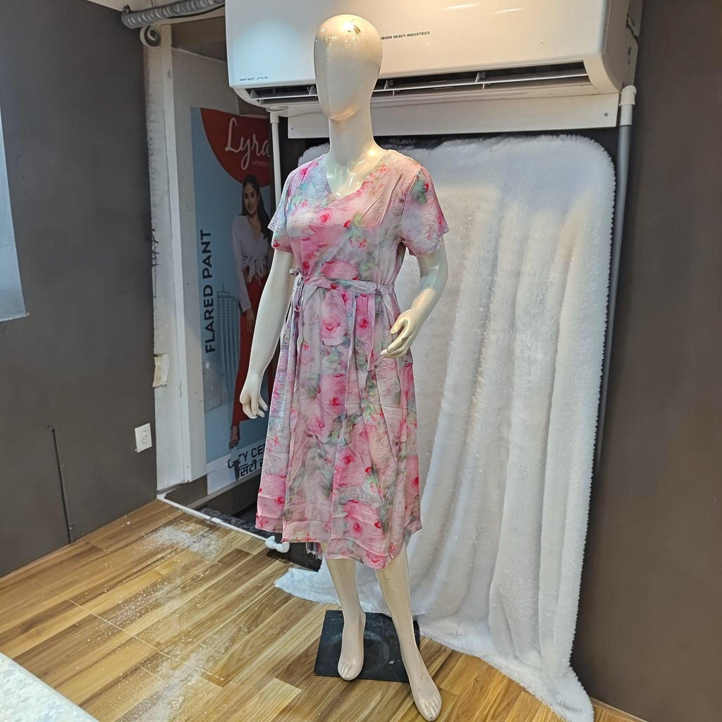 City Center floral print midi dress with a V-neck, short sleeves, and a cinched waist on a mannequin
