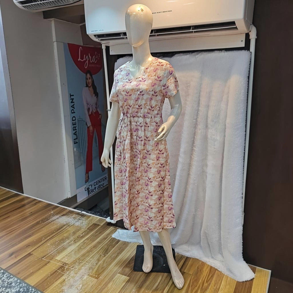 City Center floral print midi dress with v-neck and cinched waist on a mannequin