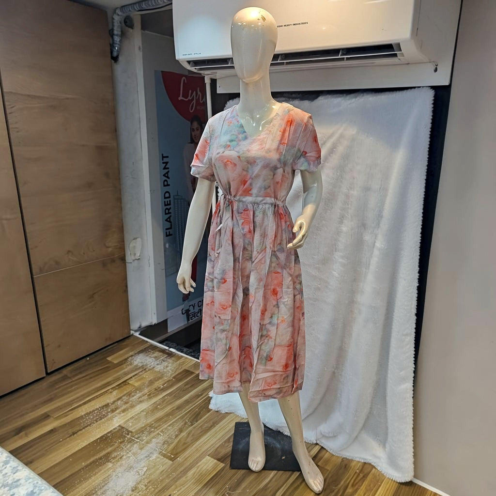 City Center floral print midi dress with v-neck and cinched waist on a mannequin in a retail setting