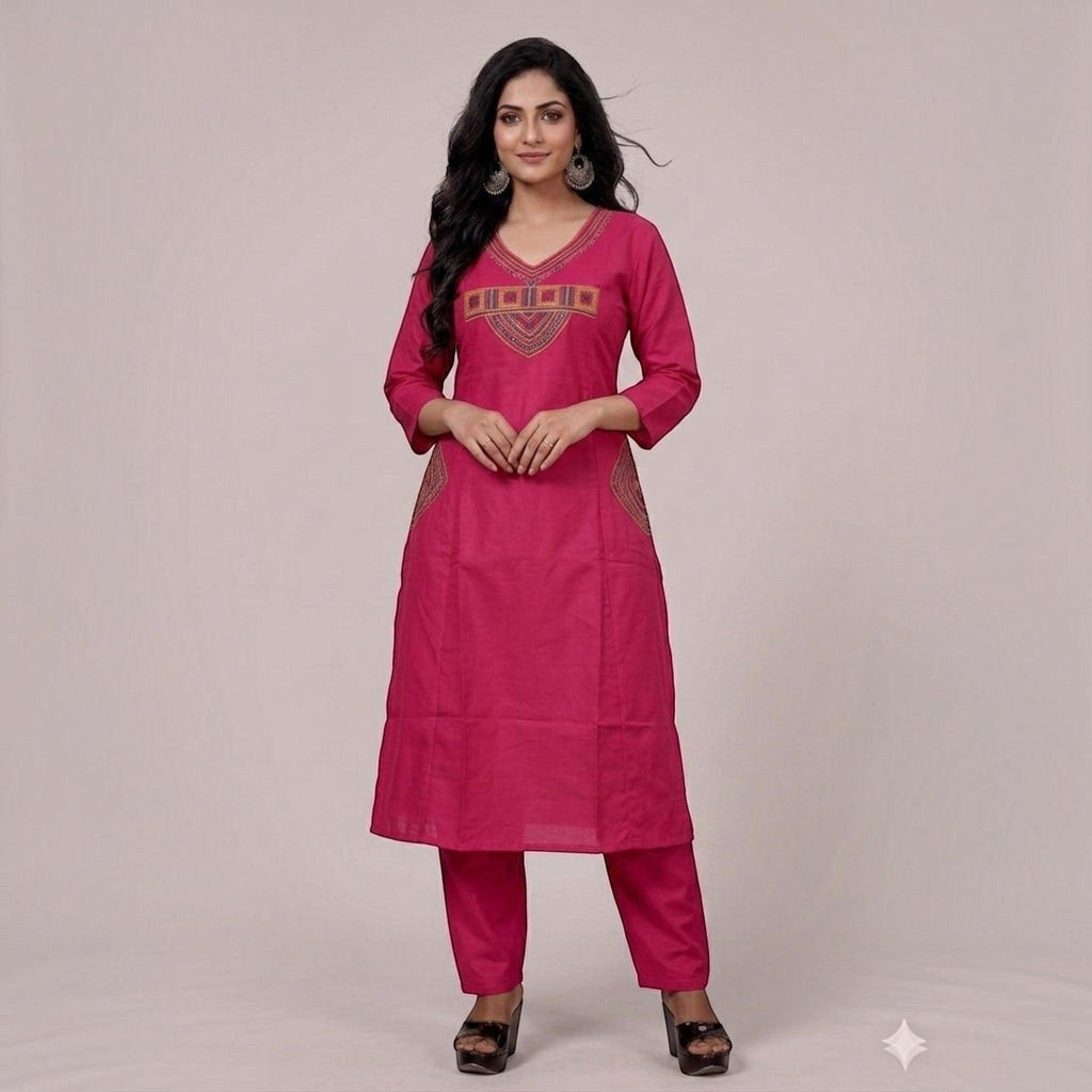 City Center fuchsia pink kurta and pant set with V-neckline and intricate ethnic embroidery on a model