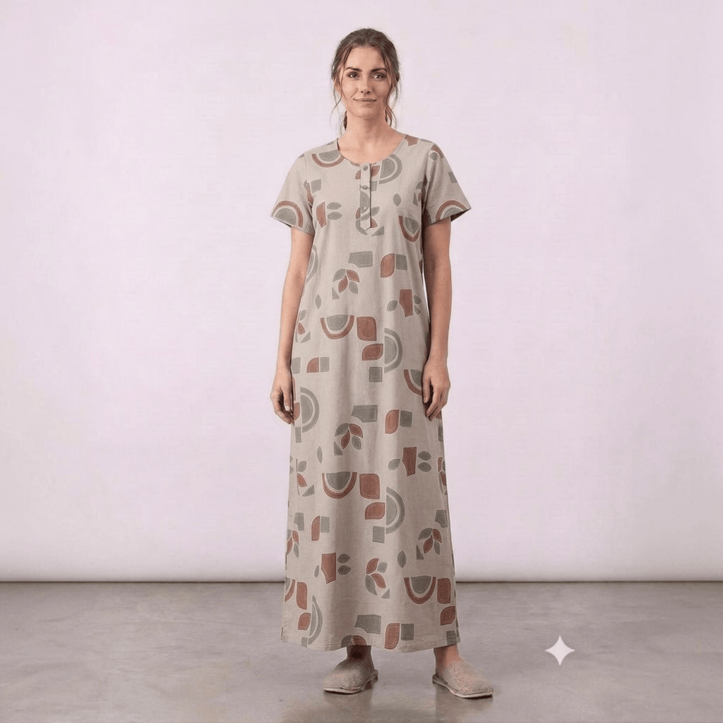 City Center women's beige feeding gown with geometric print, short sleeves, and button-down front in alpine fabric.