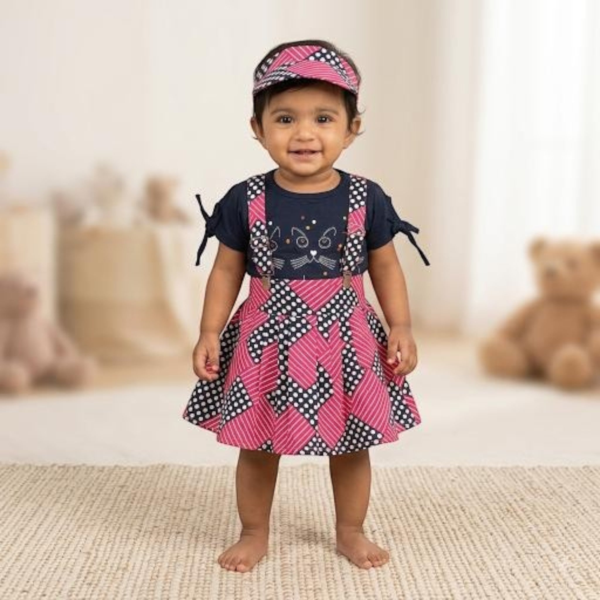 City Center Shishu Care girls ethnic outfit featuring a navy cat print top and pink geometric polka dot skirt set
