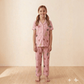 City Center girls pink pajama set with flamingo and leaf print, button-down shirt, and soft stretchable fabric.