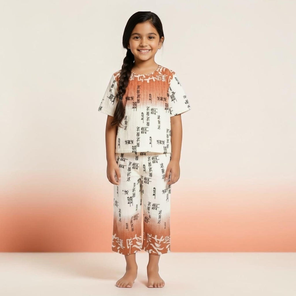City Center girls pleated co-ord set with ombre gradient and black typography print on a cream background