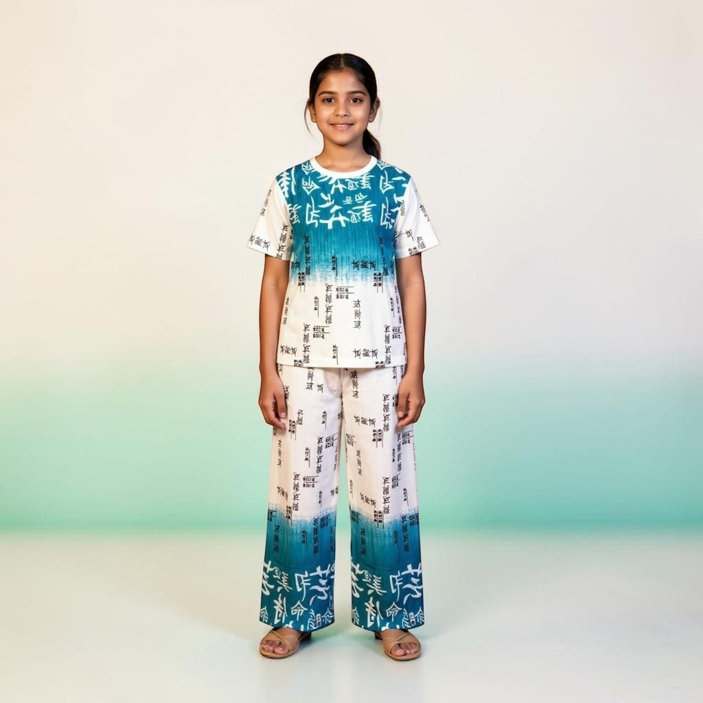 City Center girls two-piece co-ord set featuring a white and teal ombre pleated top and trousers with typography print
