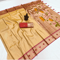 City Center golden tissue Paithani saree with lotus motifs, pink border, and matching premium blouse piece.