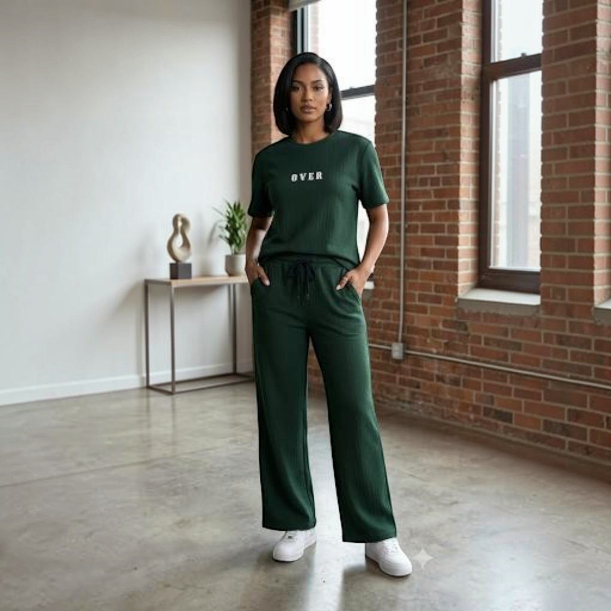 City Center Korean Airport cord set in dark green with a relaxed fit top and wide-leg trousers on a model